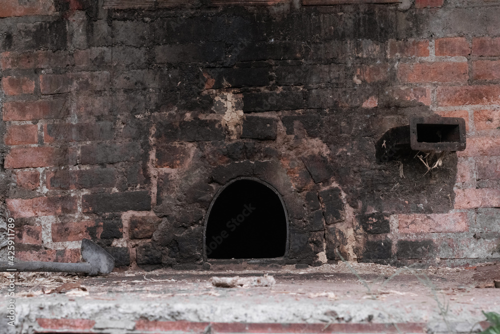 Oven used to heat pails in the artisanal process of making panela made with sugar cane Oven used to heat pails in the artisanal process of making panela made with sugar cane