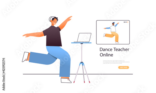 male dancer doing dancing exercises while watching online video training program with dance teacher workout concept