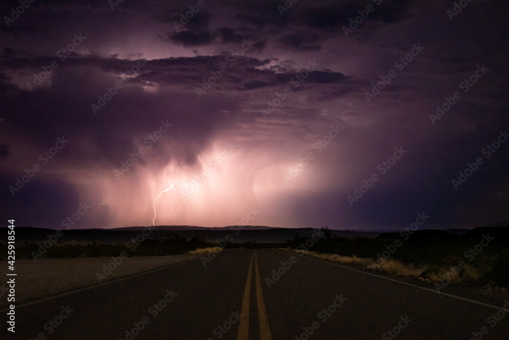 lightning striking on the open road