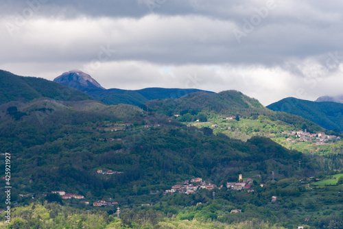Spring in the Tuscan mountains. Villages and towns in the Italian Mountains. Panorama of old stone settlements.