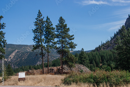 Beautiful landscape with mountains, forest and large rocks on a sunny day. Recreation Area, I-90, Alberton, Montana, USA 9-3-2020 photo