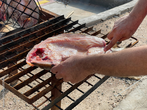 basra, Iraq - april 27, 2020:  photo fish grill in the street of basra city