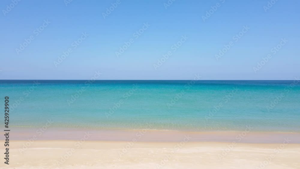 Aerial view in perspective of drone. Phuket beach sea sand and sky. Landscape view of beach sea in summer day. Beach space area. At Karon Beach, Phuket, Thailand. On 6 April 2021. 4K UHD. Video Clip Aerial view in perspective of drone. Phuket beach sea sand and sky. Landscape view of beach sea in summer day. Beach space area. At Karon Beach, Phuket, Thailand. On 6 April 2021. 4K UHD. Video Clip