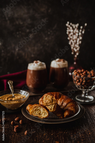 Croissant with peanut butter and hot cacao