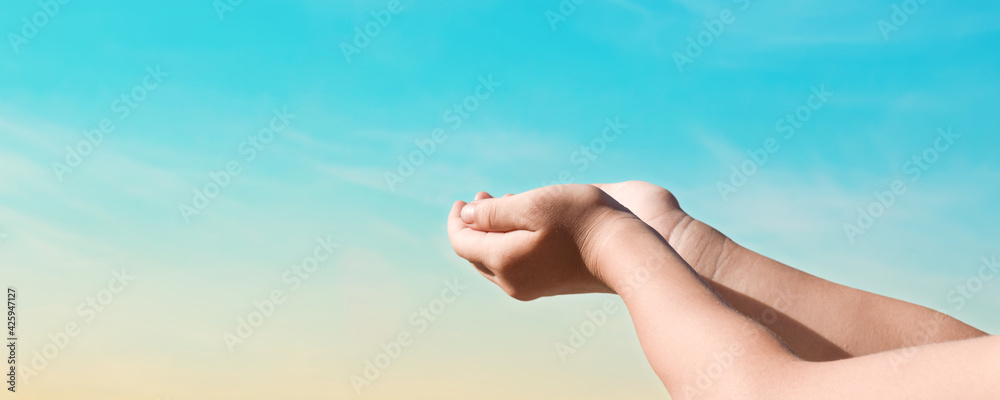 Hands reaching for the sky sunset background. Hope concept Hands reaching for the sky sunset background. Hope concept