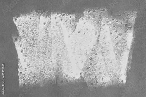 abstract textured handmade artistic painting on gray rough paper