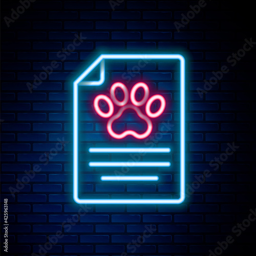 Glowing neon line Clipboard with medical clinical record pet icon isolated on brick wall background. Health insurance form. Medical check marks report. Colorful outline concept. Vector