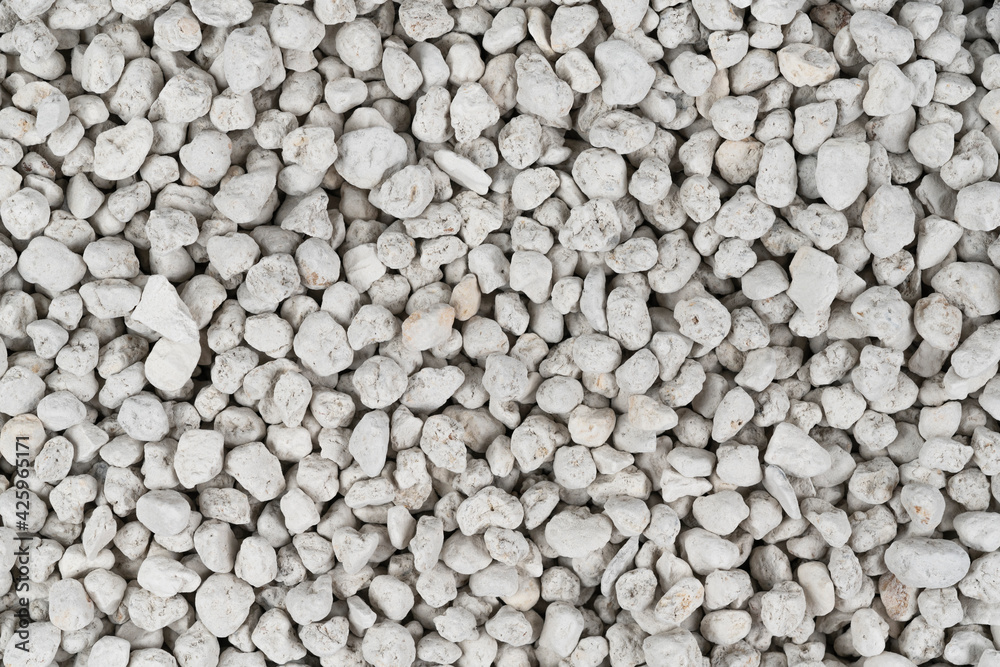 White pebbles background texture. Rock background. clay pebbles White pebbles background texture. Rock background. clay pebbles