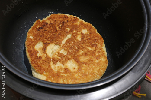 Baking flatbread in the multicooker kitchen machine.