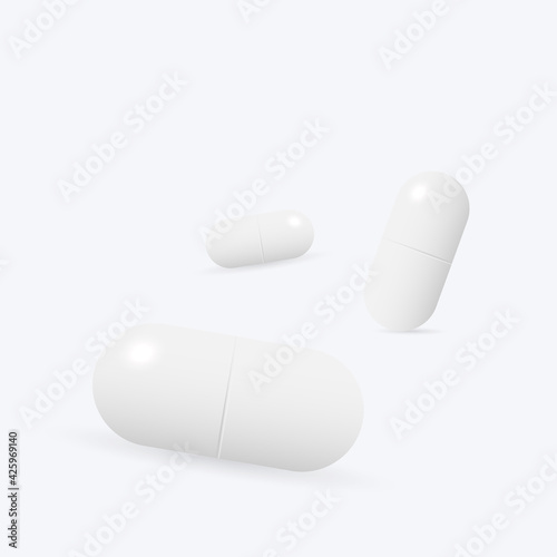 Two white medicine capsules. Medicament pills. Pharmaceutical drugs.