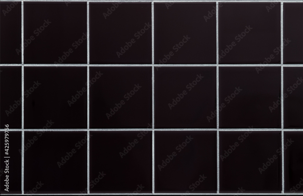 Black ceramic bathroom wall tile pattern for background