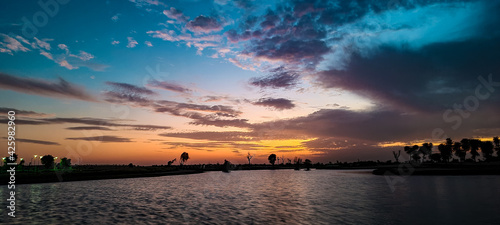 Fototapeta Naklejka Na Ścianę i Meble -  Sunset Over The Lake - Dubai 