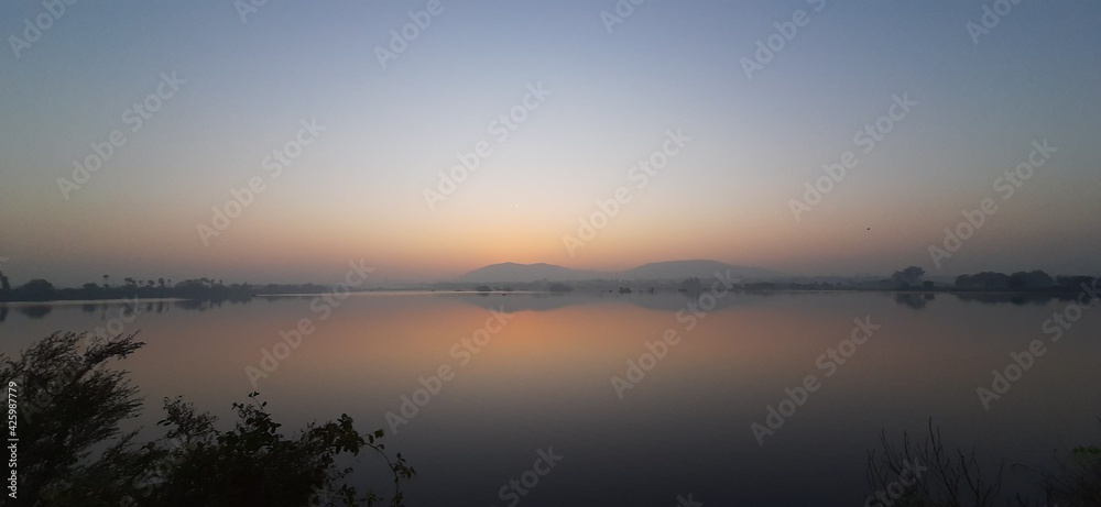 Sunrise over lake With Early Morning 