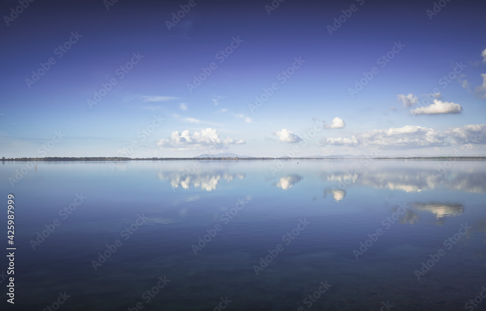 Blue lagoon landscape and reflection. Orbetello, Argentario, Italy. Blue lagoon landscape and reflection. Orbetello, Argentario, Italy.