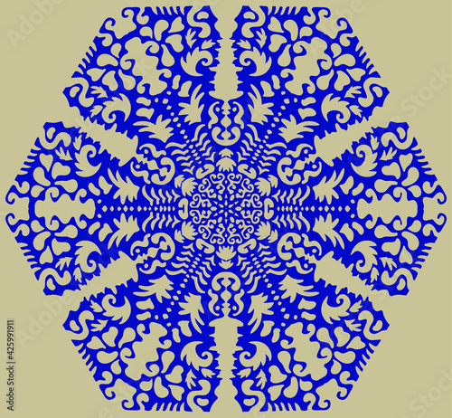 Blue silhouette of snowflakes on a beige background. Winter composition. Christmas, New Year.