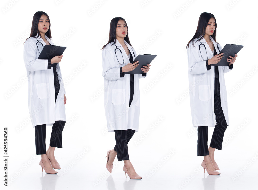 Doctor Female stands holding files and turns 360 around full length Doctor Female stands holding files and turns 360 around full length
