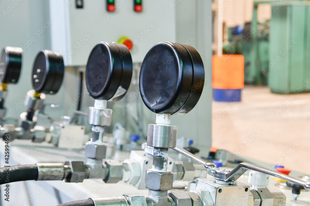 Pressure gauges on hydraulic oil station with high pressure transfer tubes. Pressure gauges on hydraulic oil station with high pressure transfer tubes.