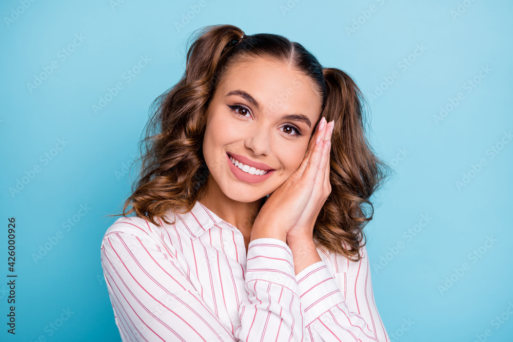 Photo portrait cute nice pretty female student keeping hands together near face smiling isolated vivid blue color background