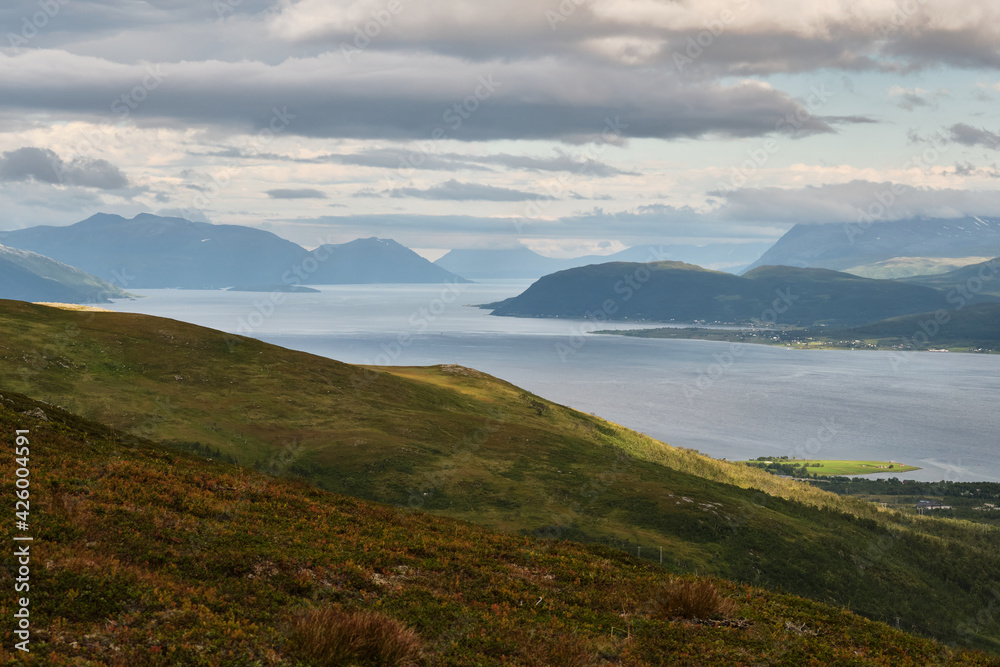 Scenic view of the sea and the mountains from the top of a mountain Scenic view of the sea and the mountains from the top of a mountain