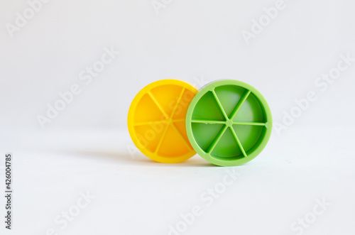 Fotografie Green and yellow circles, representation of citrus fruits