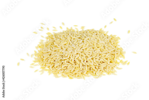 Pasta shaped like rice on white background