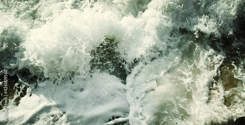 abstract background of waves of water creating swirls and ripples