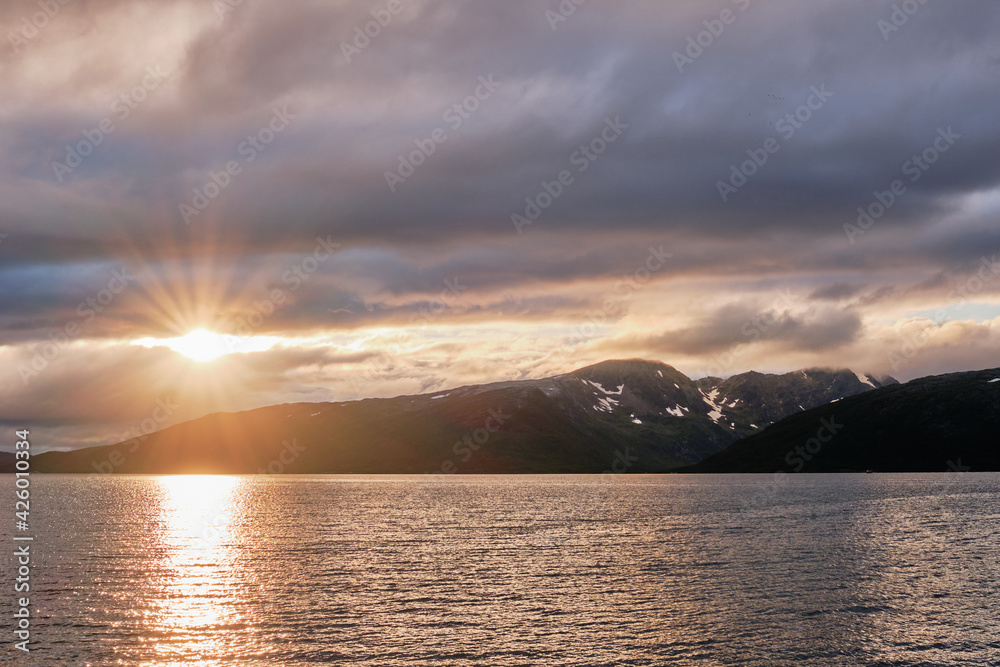 Beautiful sunset over the sea near Tromso