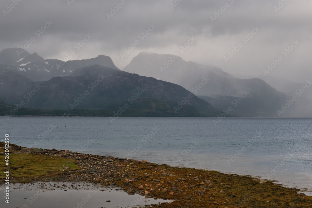 Scenic view of clouds and mountains near Tromso