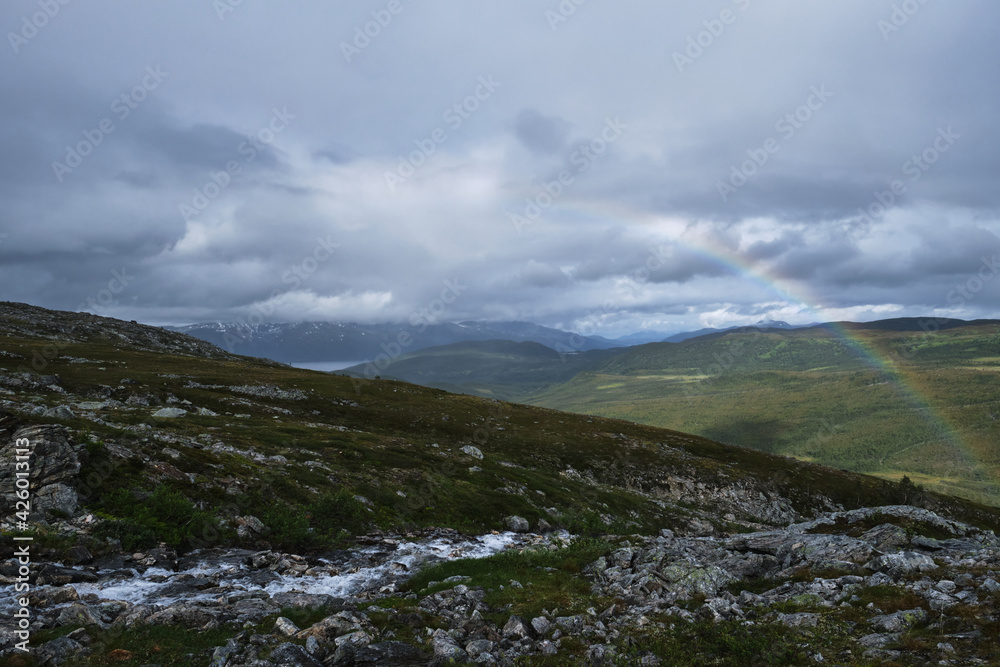 Scenic view of clouds and mountains near Tromso