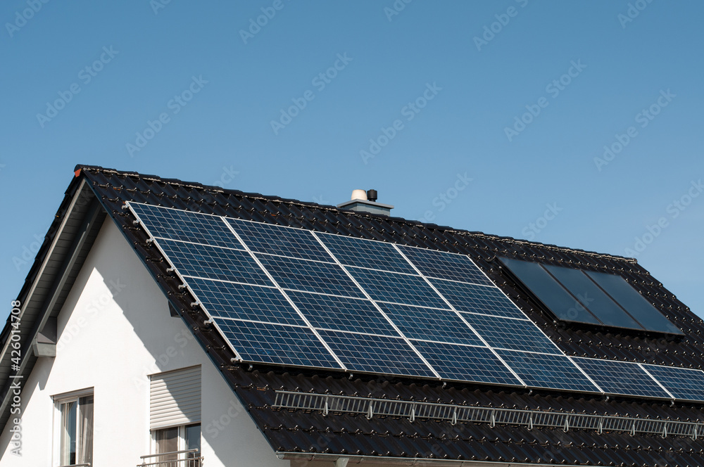 a roof of a building with solar panels
