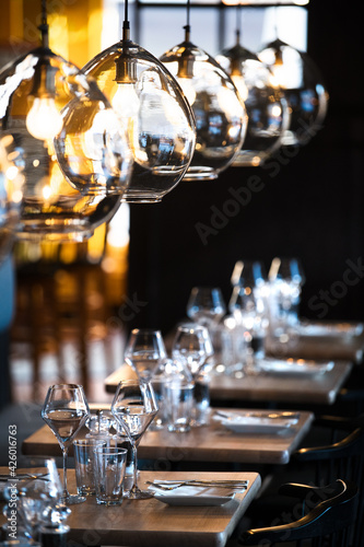 Elegant restaurant view of tables and lamps
