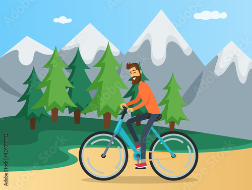 Guy is riding in mountains. Person spends time with bicycle on background of nature landscape
