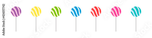 Set of colorful sweet lollipops. Round candies on a stick. Delicious and appetizing. Vector illustration.