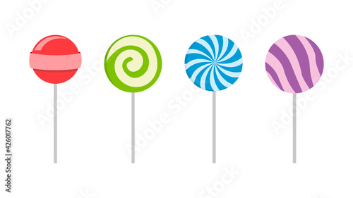 Set of colorful sweet lollipops. Round candies on a stick. Delicious and appetizing. Vector illustration.