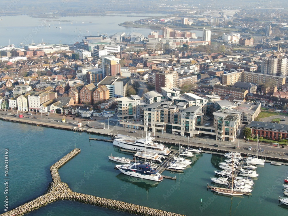 aerial view of Poole harbour showing the marina and town