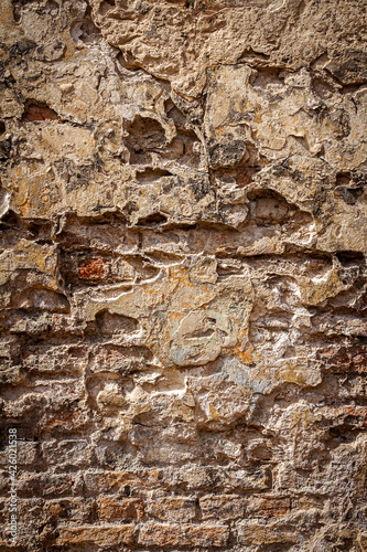 Old brick and plaster wall texture background
