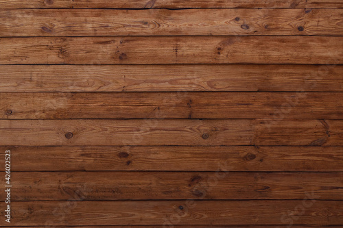 Brown table from wooden planks. Wooden background, texture.