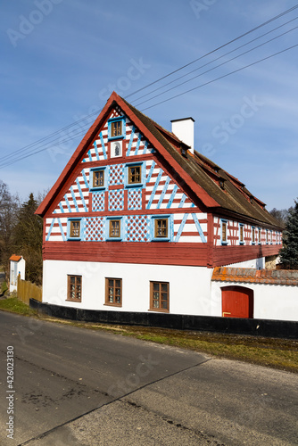 Half-timbered farmhouse, folk architecture in Milhostov, Western Bohemia, Czech Republic