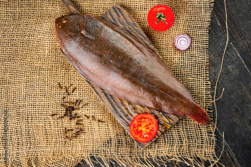 Canvas Print Raw fresh sole fish on a cutting board