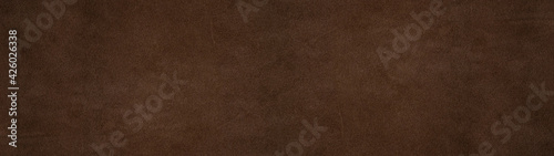 Old brown dark rustic leather - Suede, buckskin background banner panorama long.