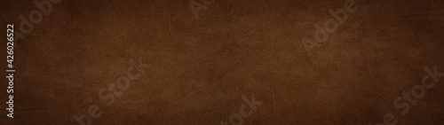 Old brown dark rustic leather - Suede, buckskin background banner panorama long.