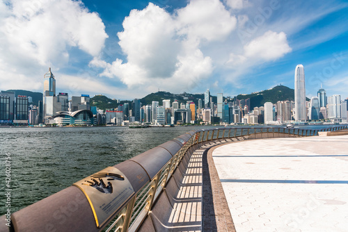 Tourists visiting the Avenue of the Stars. The Avenue of Stars is located along the Victoria Harbor in Hong Kong. 