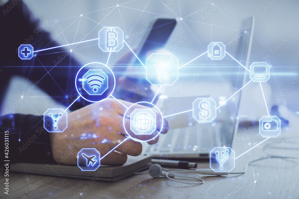 Double exposure of man's hands holding and using a phone and social network theme drawing. Double exposure of man's hands holding and using a phone and social network theme drawing.