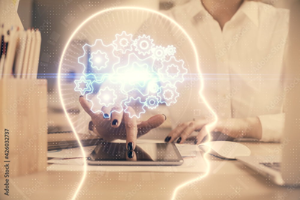 Double exposure of brain sketch hologram and woman holding and using a mobile device. Double exposure of brain sketch hologram and woman holding and using a mobile device.