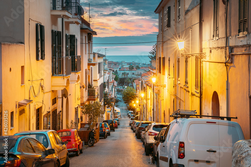 Terracina  Italy. Cars Parked On Narrowm Street In European City In Summer Night