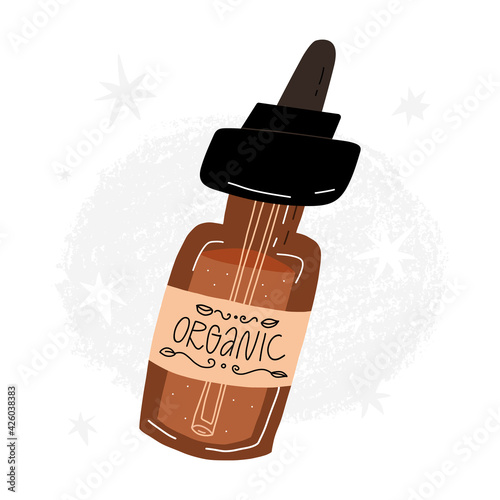 Beauty serum in glass bottle with a pipette-cap. An organic liquid emulsion for the face skincare.
