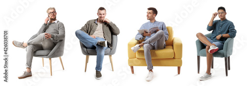 Young men relaxing in armch...