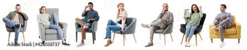 Young people relaxing in armchairs on white background photo