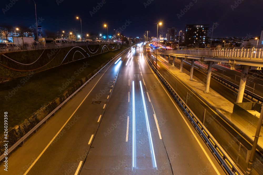 Sisli, Istanbul, Turkey - 02.17.2021: D-100 road with long exposure method and car lights stretching with copy space Sisli, Istanbul, Turkey - 02.17.2021: D-100 road with long exposure method and car lights stretching with copy space