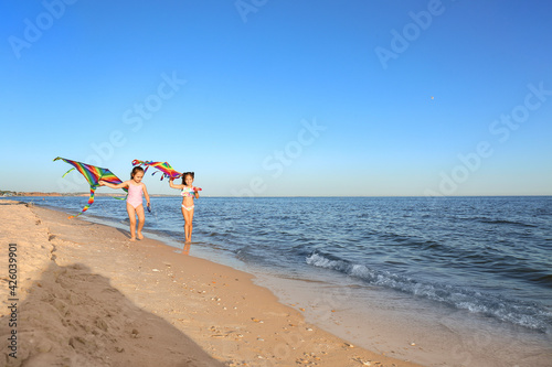 Cute little girls flying ra...